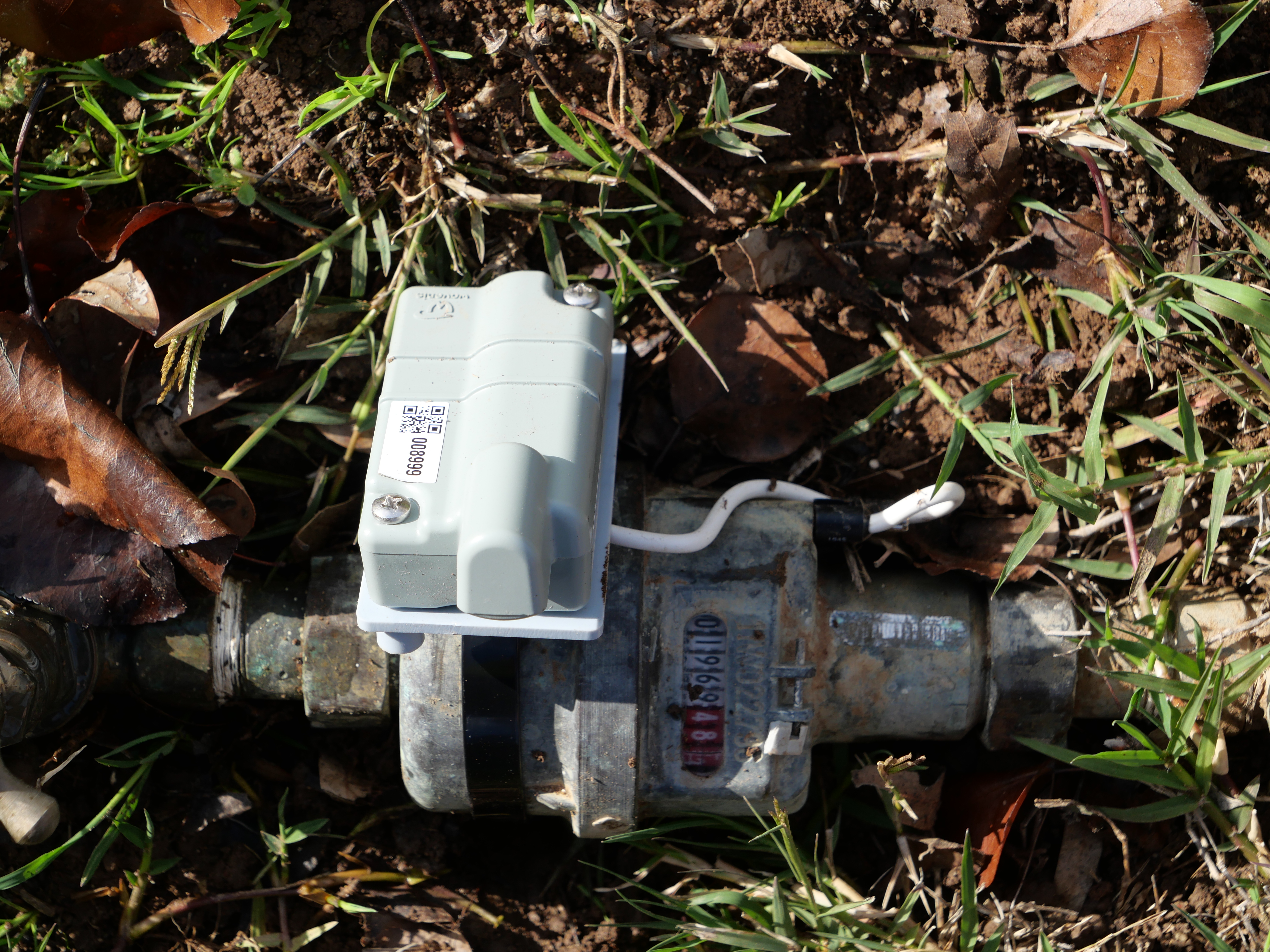 A water meter with digital logger attached