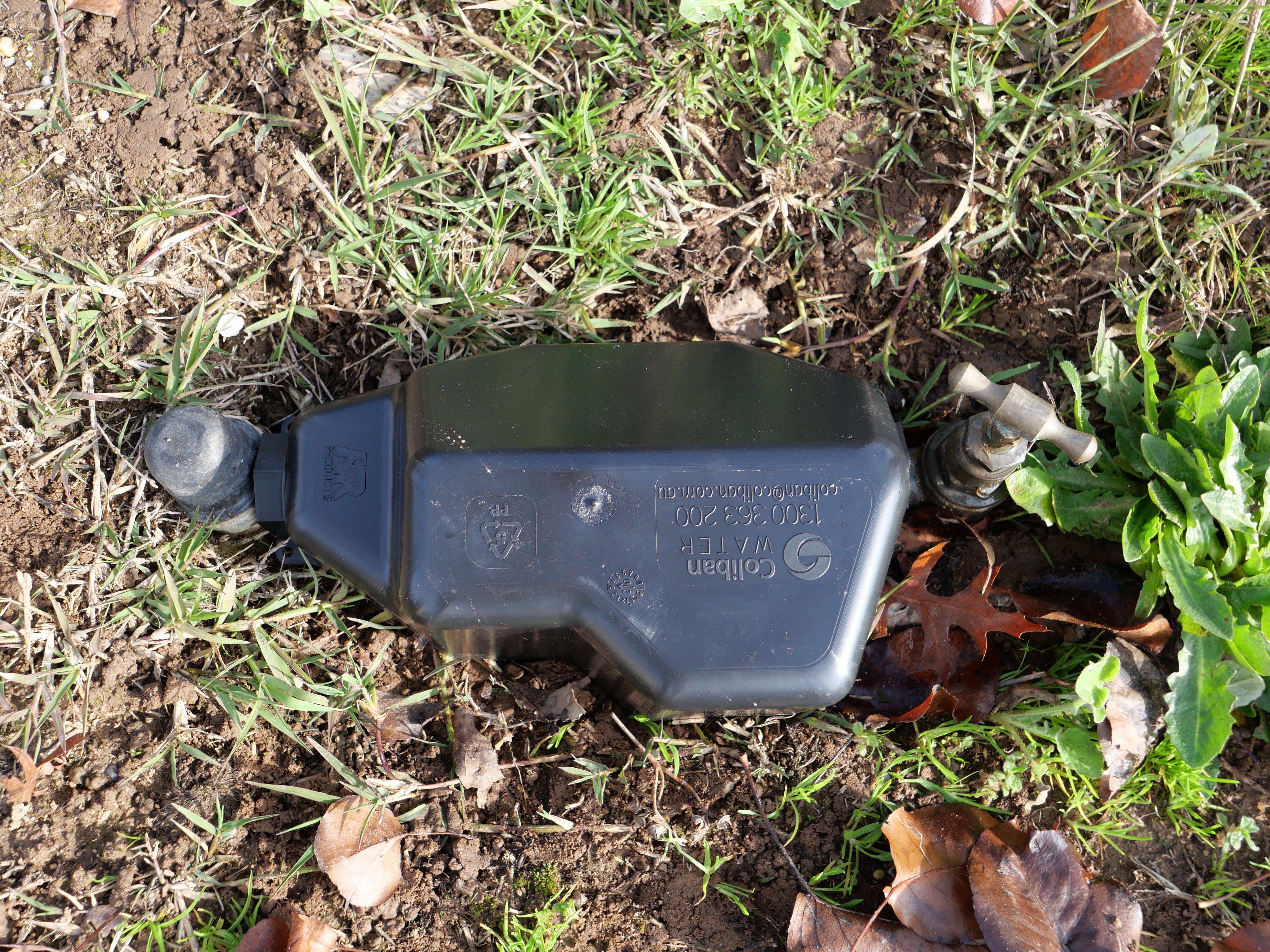 A water meter with a digital cover on it